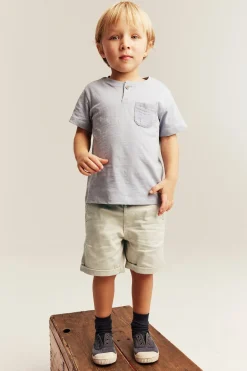 Kids beige woven shorts with pockets