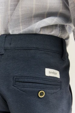 Kids blue trousers with button fastening