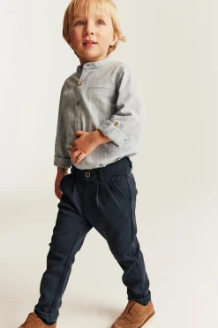 Kids blue trousers with button fastening