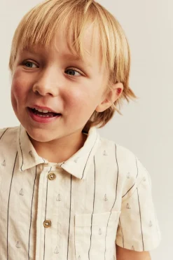 Kids cream shirt with sailboats