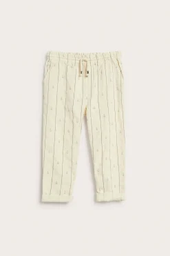 Kids cream striped trousers with sailboats