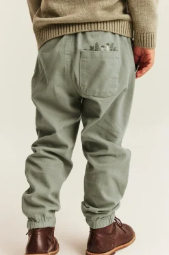 Kids green trousers with embroidery