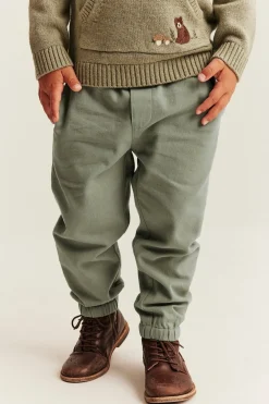 Kids green trousers with embroidery