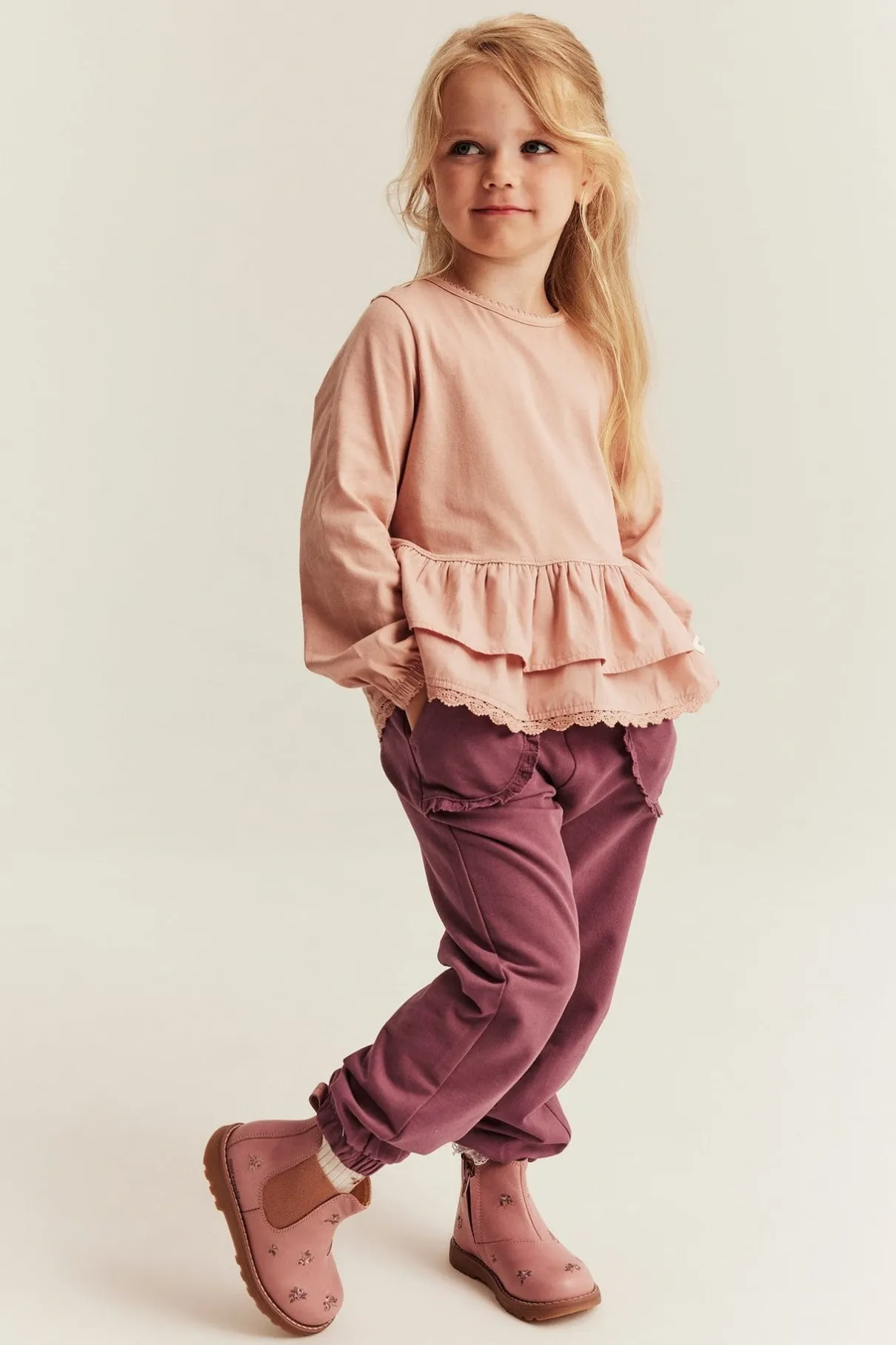 Kids jogging bottoms with lace details