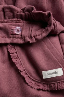 Kids jogging bottoms with lace details