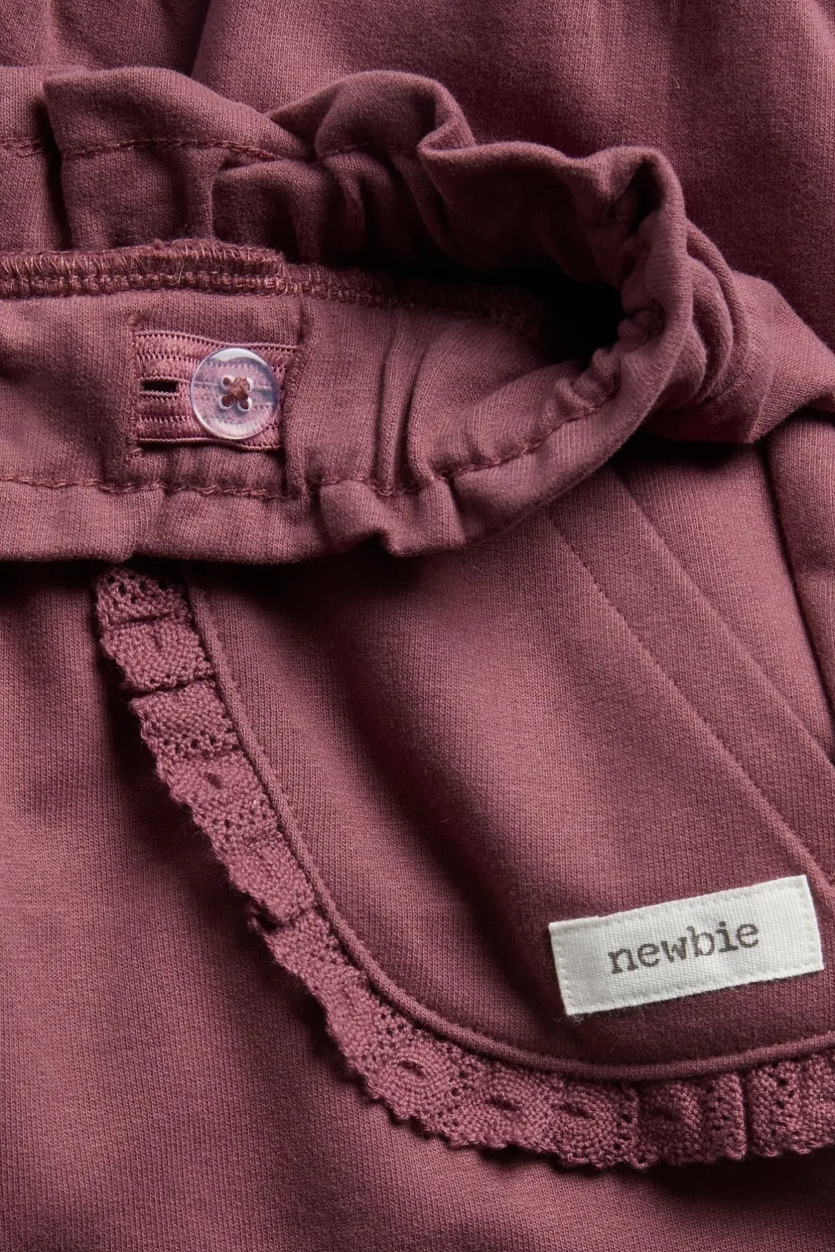 Kids jogging bottoms with lace details