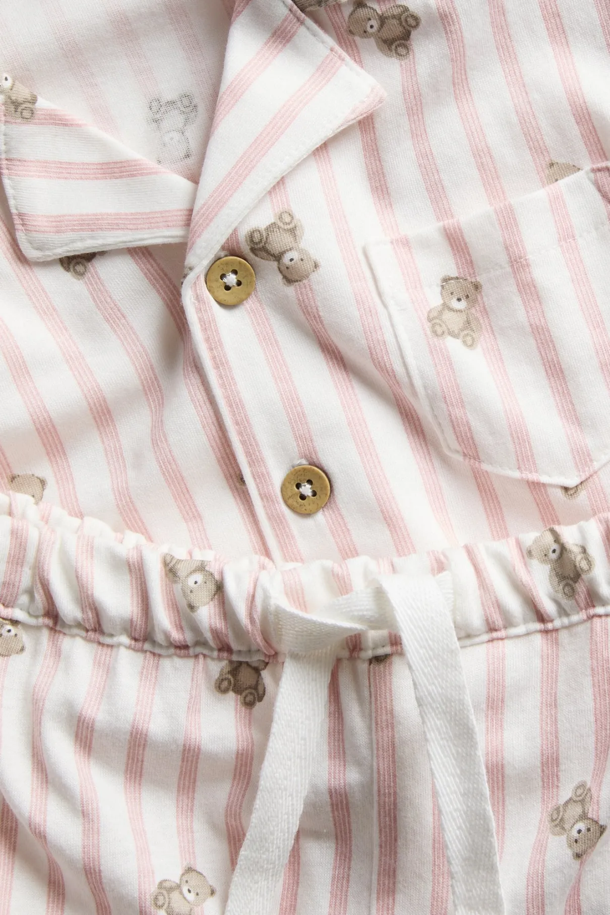 Kids striped pajamas with teddy bear motif