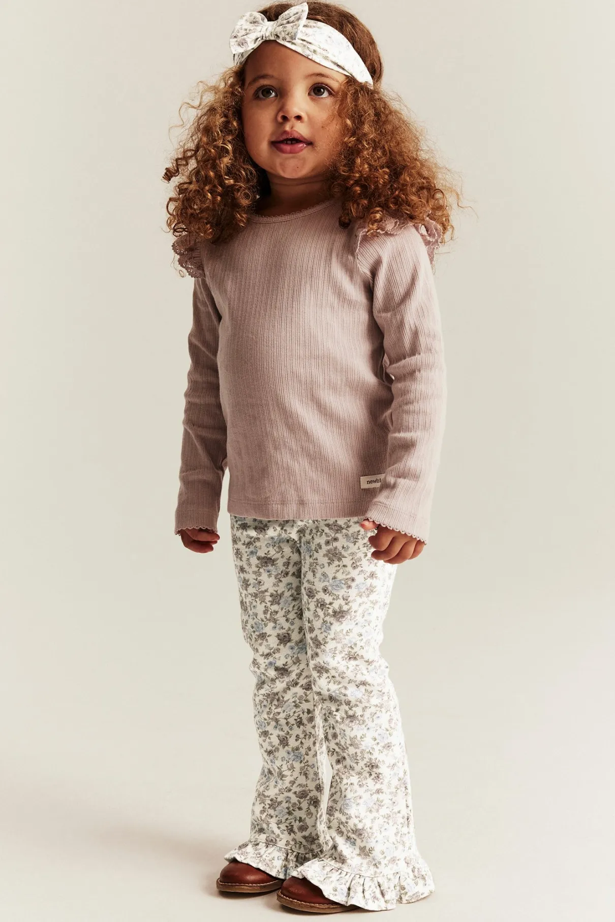 Kids' white floral jersey trousers with frill