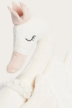 Swan‑shaped white cushion with crown