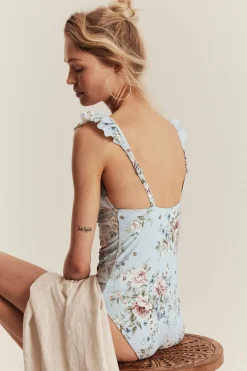 Women's blue floral swimsuit with frill detail