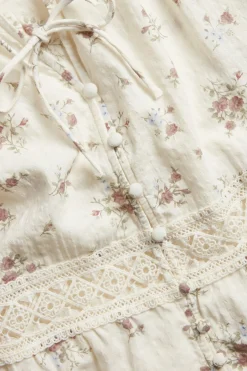 Women's white floral three-quarter sleeve blouse