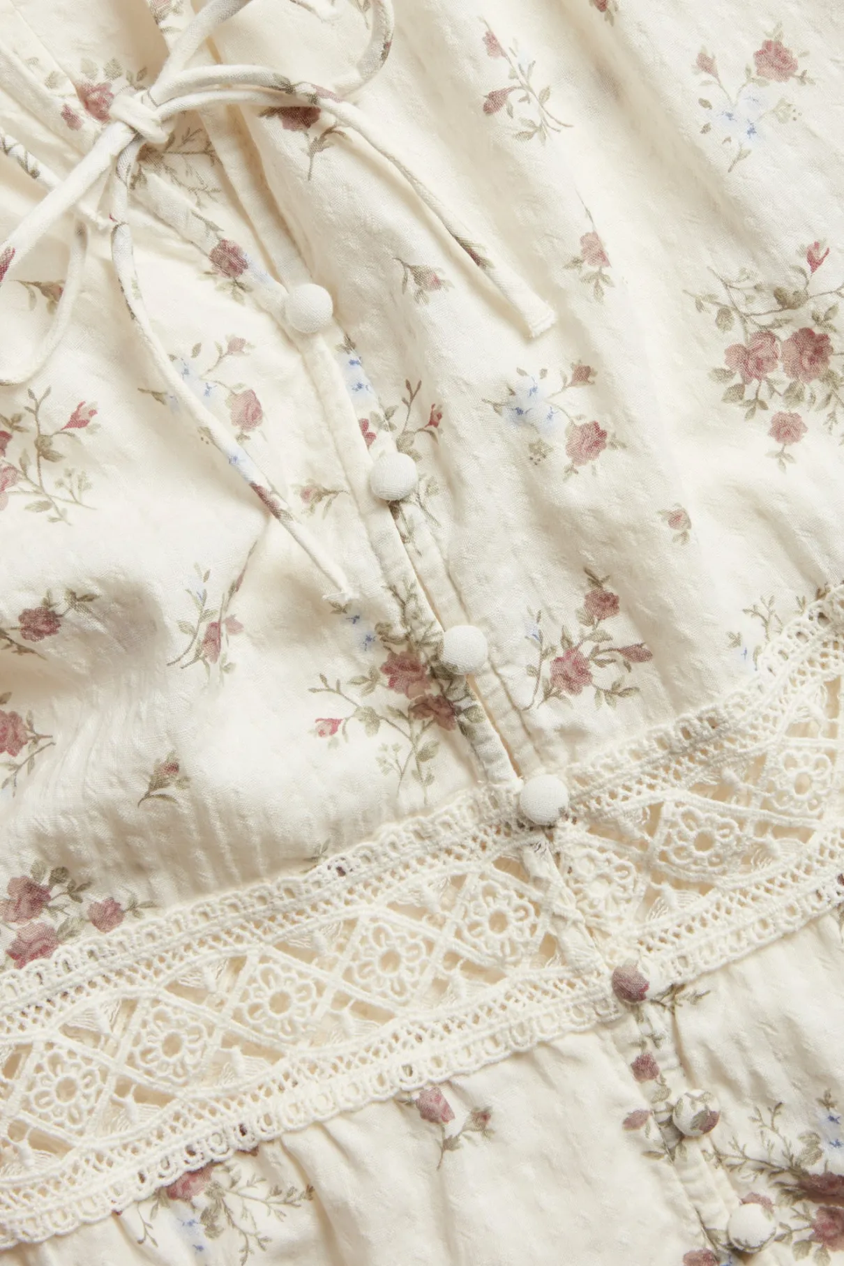 Women's white floral three-quarter sleeve blouse