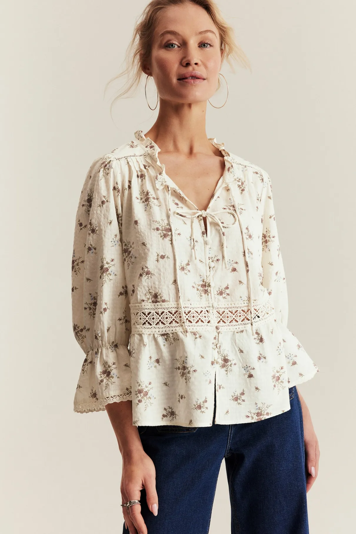 Women's white floral three-quarter sleeve blouse